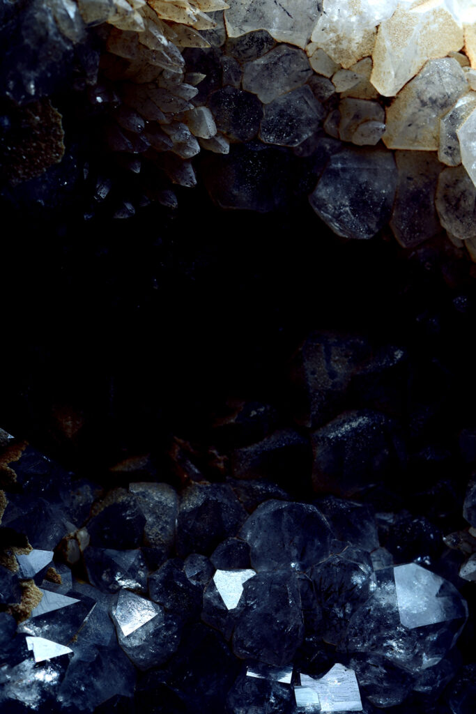A macro shot of an amethyst crystal cave.