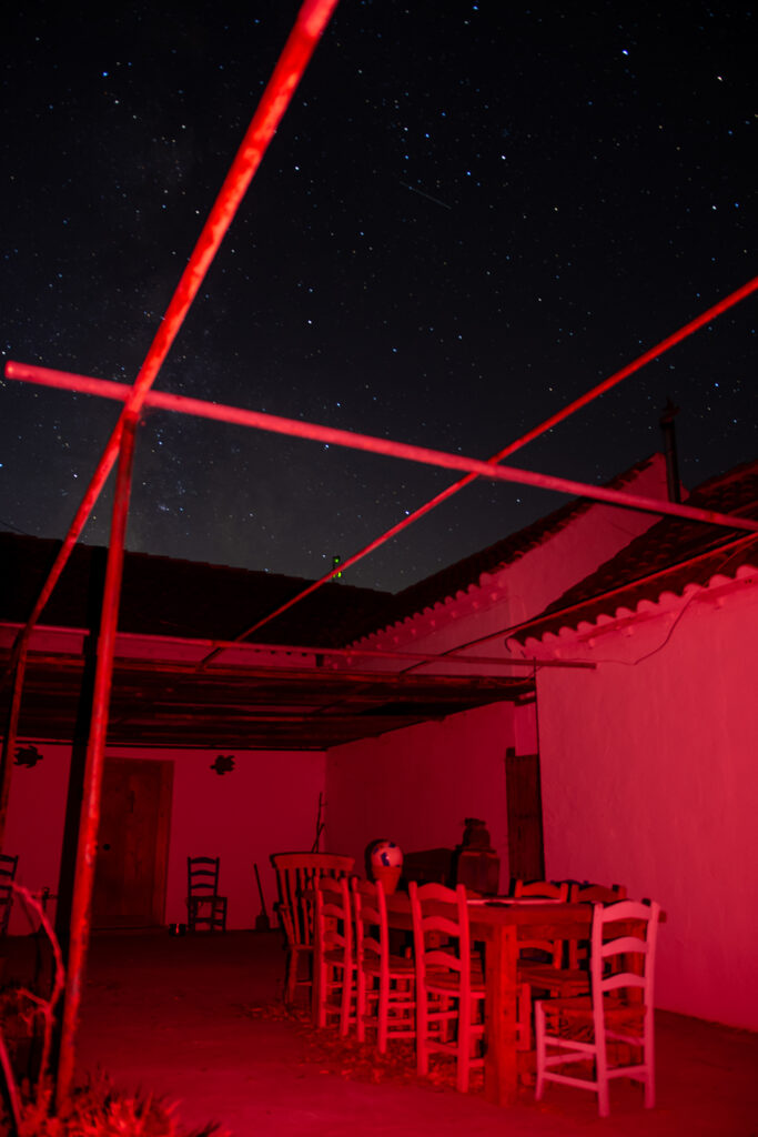 Night photography of a house, using red flash and long exposure.