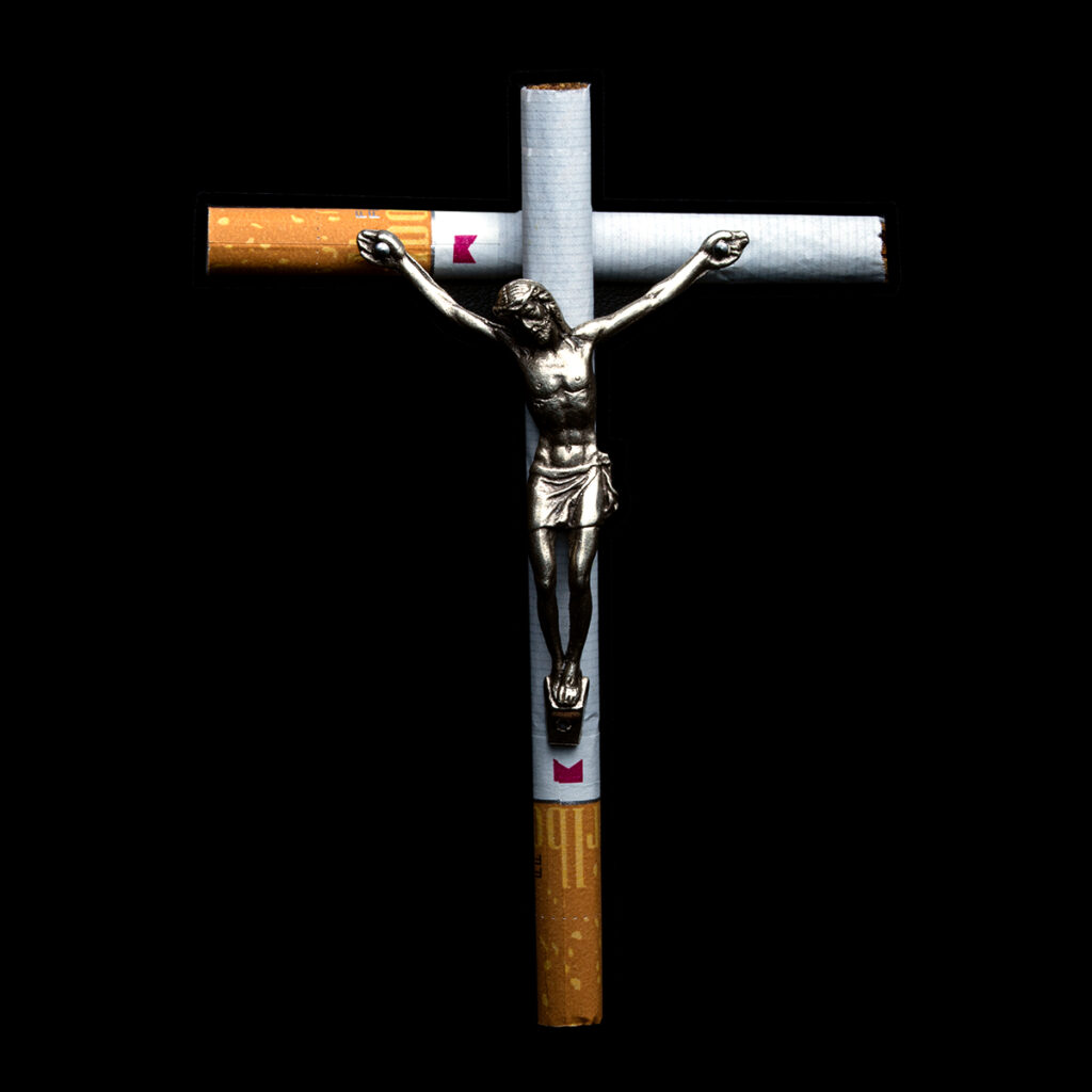 Controversial photo of Jesus crucified on a cigarette cross.