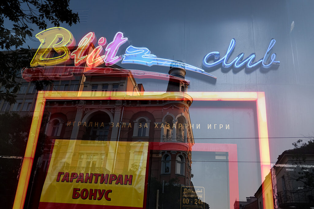 Neon lights in Bulgaria, this photograph captures a night club in Sophia, the artist uses a double exposure to create this image.
